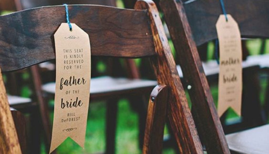 http://somethingturquoise.com/2015/11/10/diy-wedding-ceremony-chair-reserved-signs/